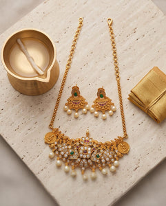 Traditional Gold Finish Lakshmi Temple Choker Necklace Set with Pearl Drop Earrings