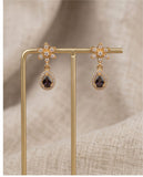 Gold Finish Floral CZ Drop Earrings with Black Teardrop Stone