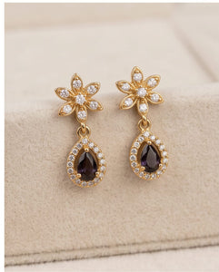 Gold Finish Floral CZ Drop Earrings with Black Teardrop Stone