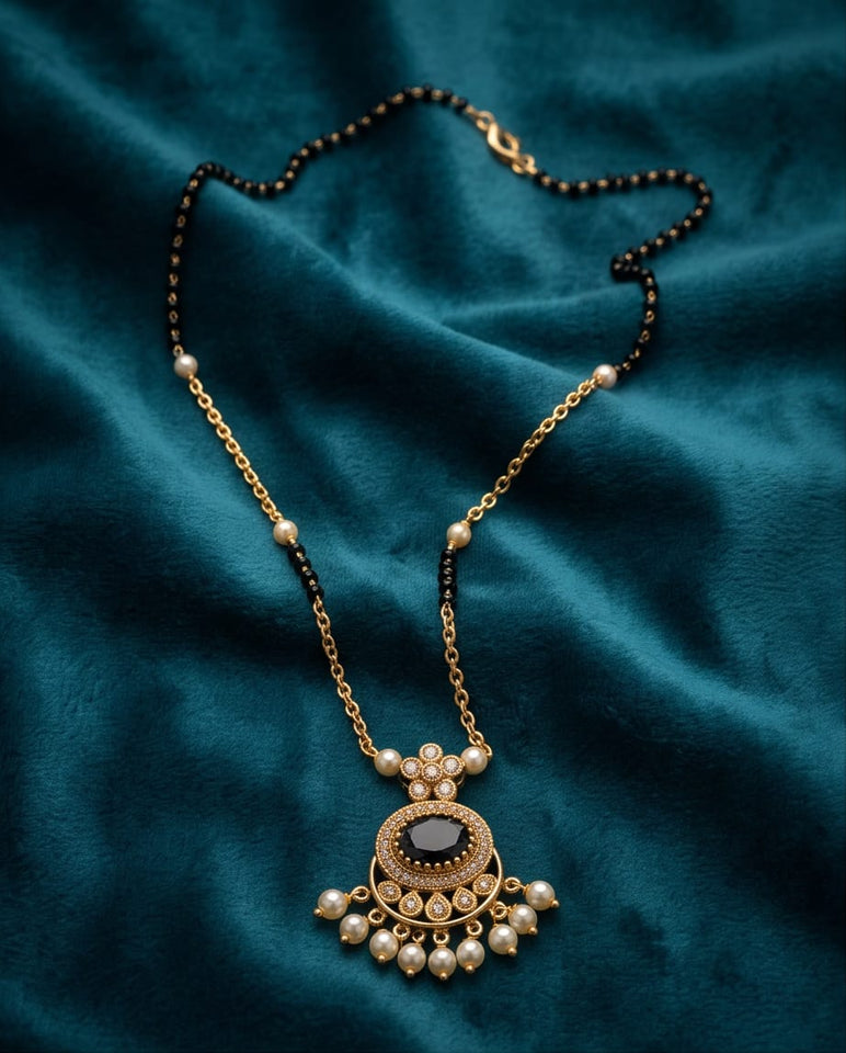 Gold-Toned Black Stone Pendant Necklace with Pearl Drops