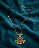 Gold-Toned Black Stone Pendant Necklace with Pearl Drops