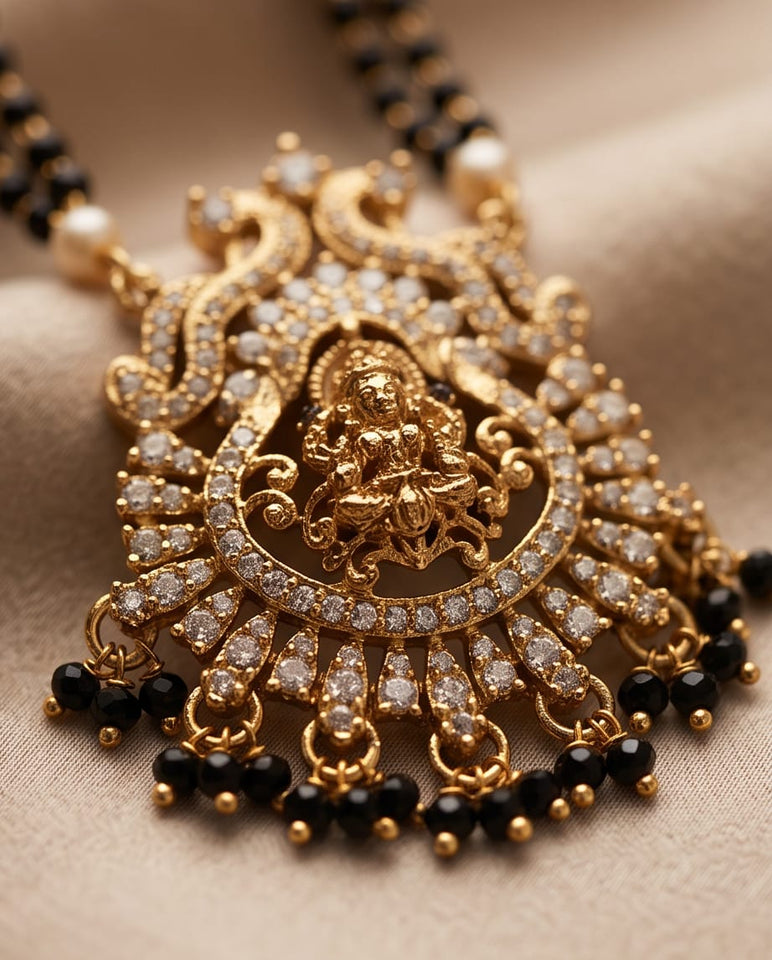 Gold-Toned Mangalsutra with Lakshmi Pendant & Black Bead Chain