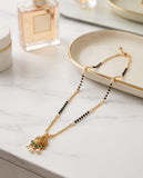 Gold-Toned Mangalsutra with Lakshmi Pendant & Green Stone Detailing