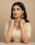 Traditional temple-style short necklace with rich antique gold polish.